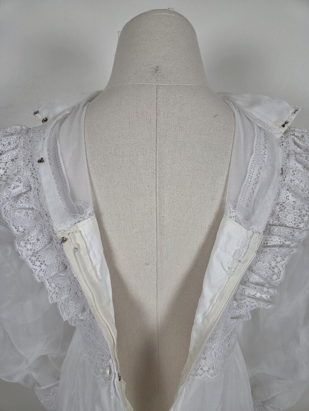 Victorian-Inspired White Lace Bridal Gown with High Neck and Sheer Puff Sleeves - Picture 4 of 13